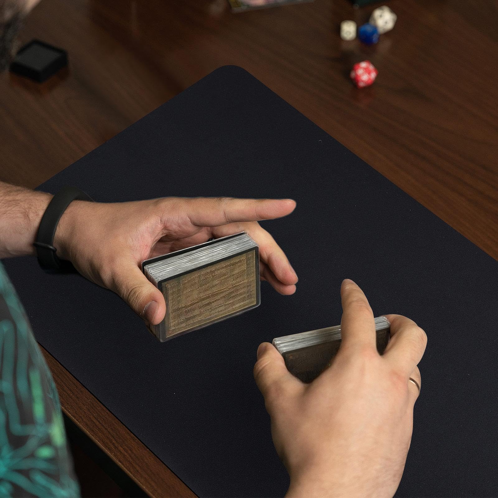 Yexiya black rubber playmat offers versatile, durable surface.