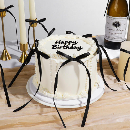 YGDZ satin black bow decorates cupcakes with an elegant finish.