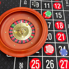 Ygebet home game night setup with wheel and two balls.