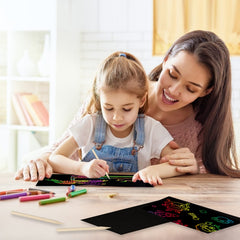 Travel-ready Yibeishu scratch art kit fits in a bag for on-the-go creativity