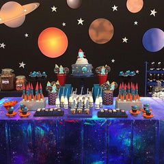 YIDAKO purple galaxy pattern tablecloth creates dreamy birthday backdrop.