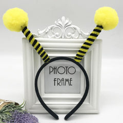Yilistore bee headband close-up showing soft plush antennae for a cute party look