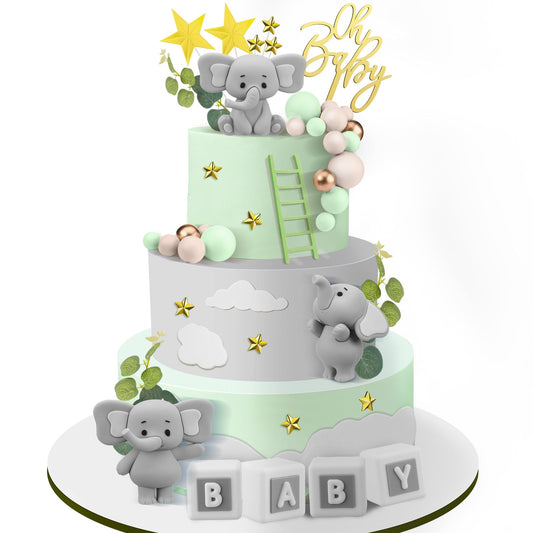 Yinder elephant cake toppers in green, adding playful elegance to celebrations