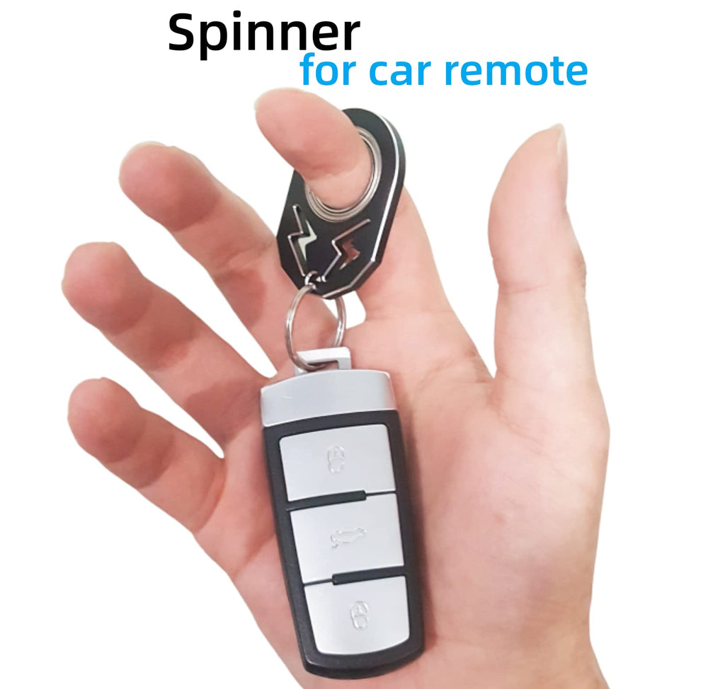 YIPUKIYI keychain spinner inner ring closeup highlighting smooth rotation