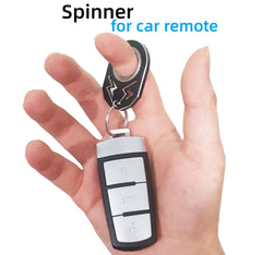 YIPUKIYI keychain spinner inner ring closeup highlighting smooth rotation