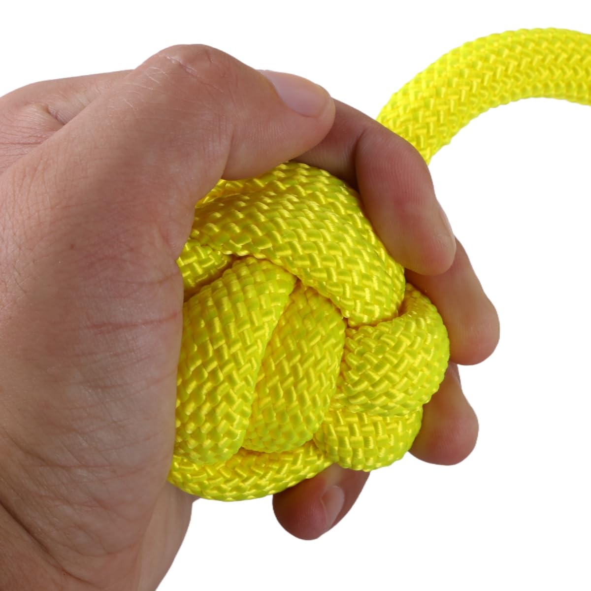 Ymeibe Ninja Fist Hold yellow ball for high-visibility grip practice outdoors
