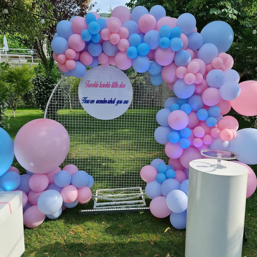 YMSZ birthday party decor with pink blue balloons for festive celebrations.