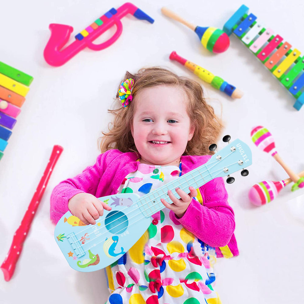 YOLOPARK kids playing guitar in blue demonstrates kid-friendly size and appeal.