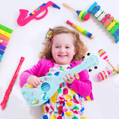 YOLOPARK kids playing guitar in blue demonstrates kid-friendly size and appeal.