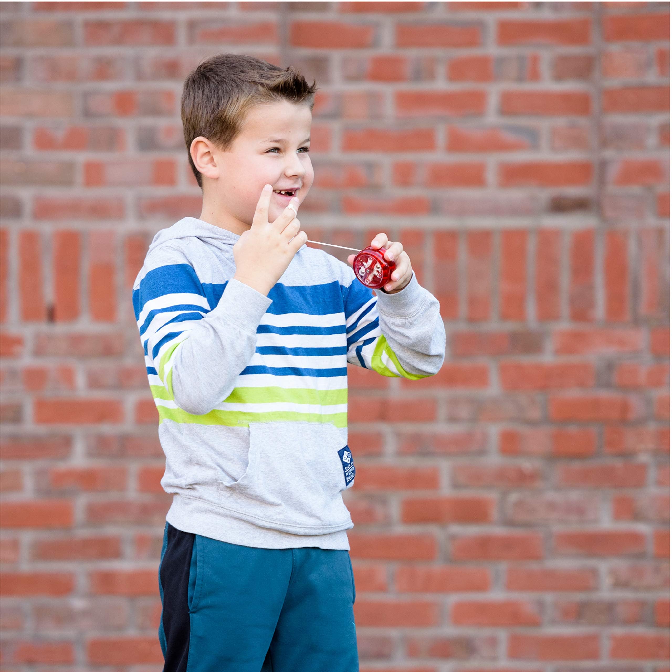 Yomega Original Brain hand-held use showing comfortable grip and responsive return.