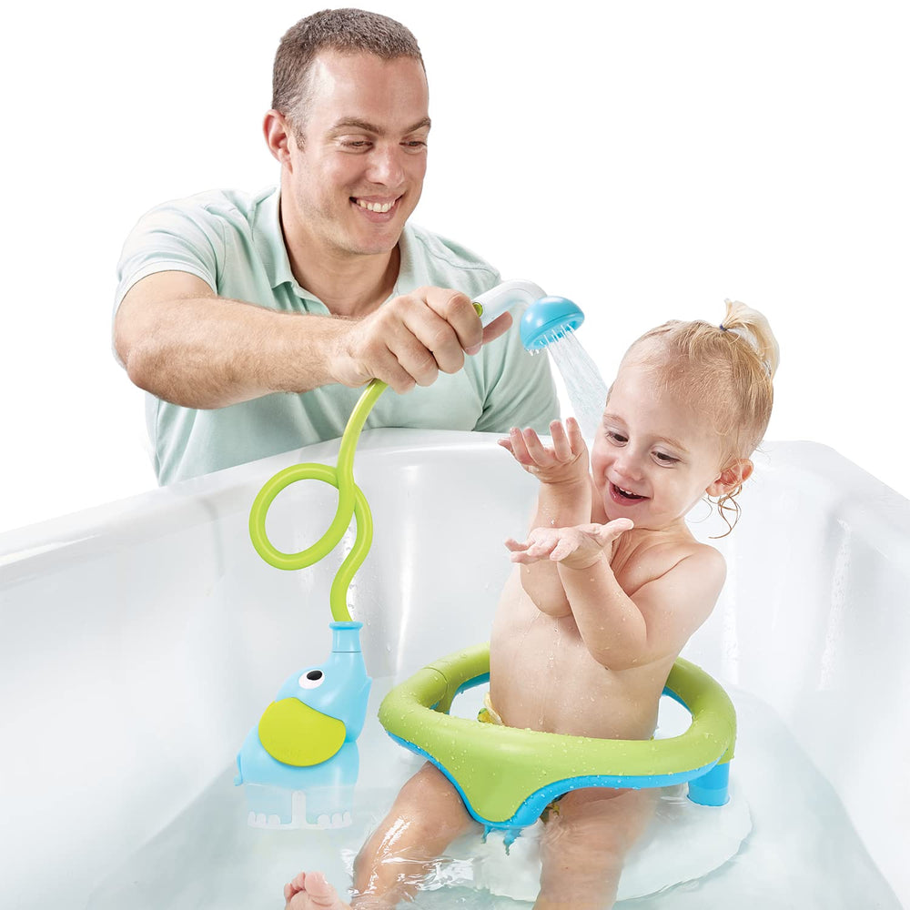 Yookidoo newborn bath accessory aids parents during routine.