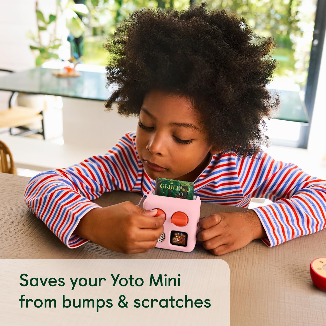 Matching wrist lanyard keeps the Yoto Mini easy to carry everywhere.