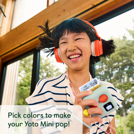 Matching wrist lanyard for the Yoto Mini, enabling easy, kid-friendly transport.