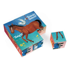 Bright illustrated scenes from Jill McElmurry's Little Blue Truck in stackable blocks.