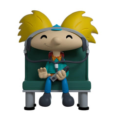 Youtooz Arnold vinyl figure wearing green sweater and plaid shirt for vivid character display.