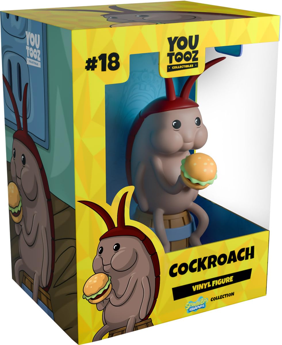 Youtooz cockroach figure on a barrel serves as a quirky desk display.