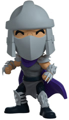 YouTooz Shredder interior purple background with vector collage adds depth.