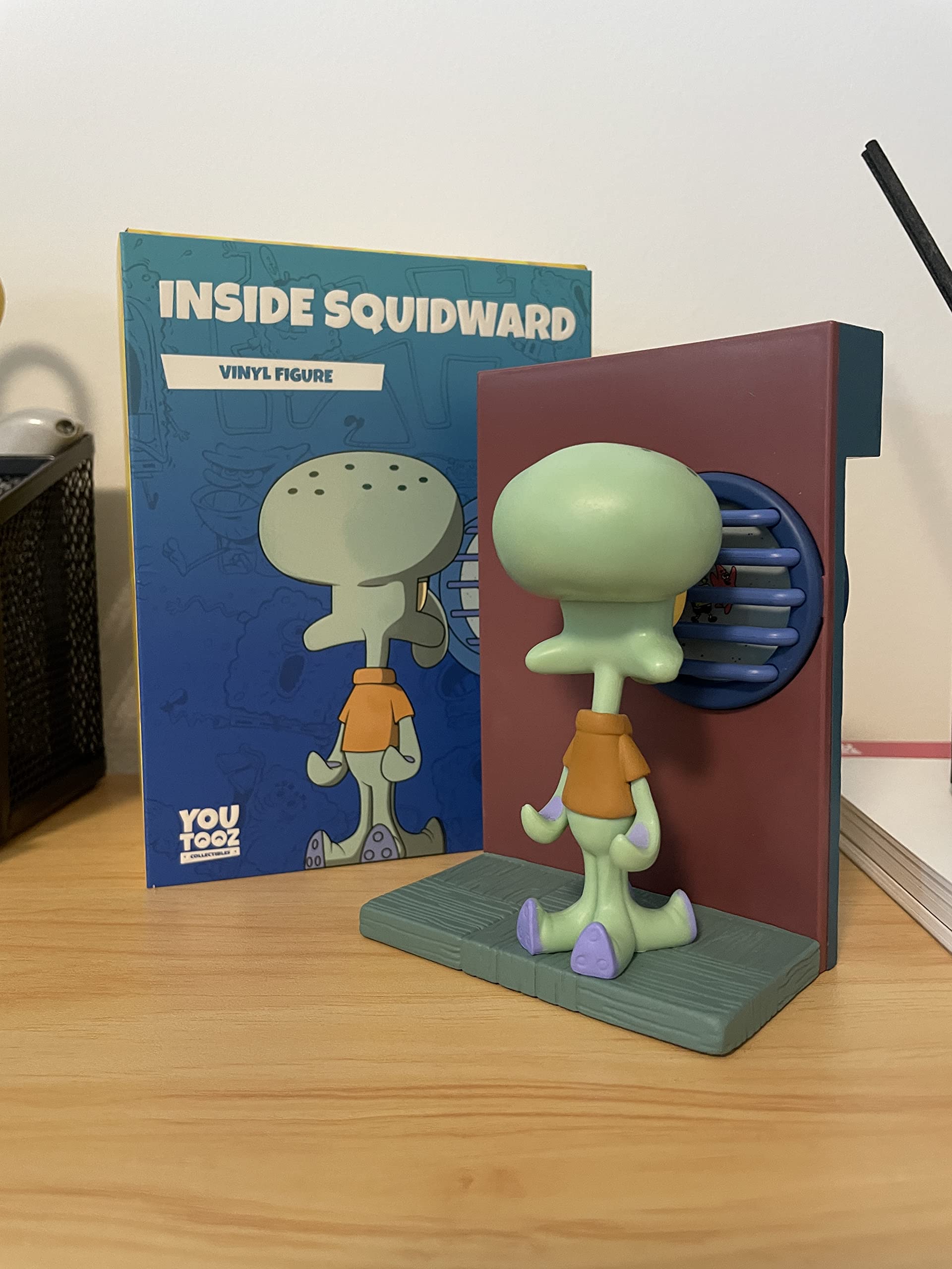 Youtooz Squidward 4-inch figure; sized for compact shelves and desks.