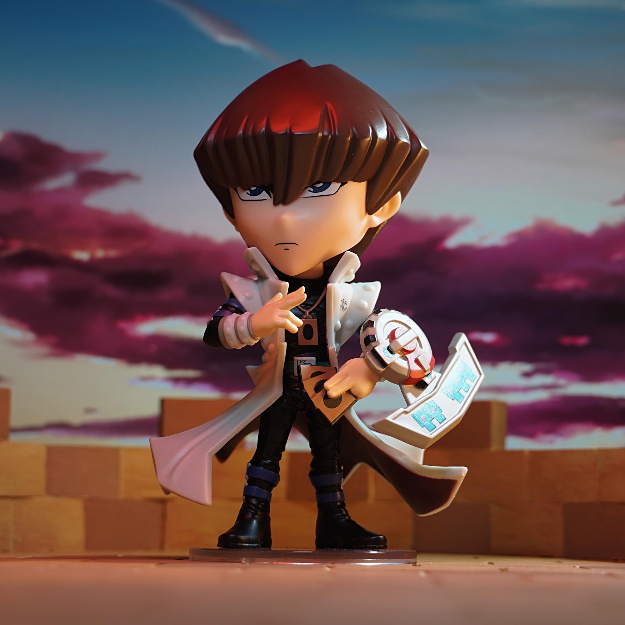 You Tooz Seto Kaiba figure gripping Blue-Eyes cards in left hand.