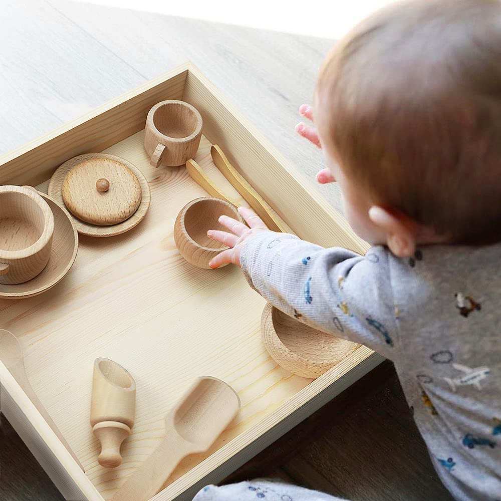 Yowlieu pouring and transferring activity supports fine motor practice.