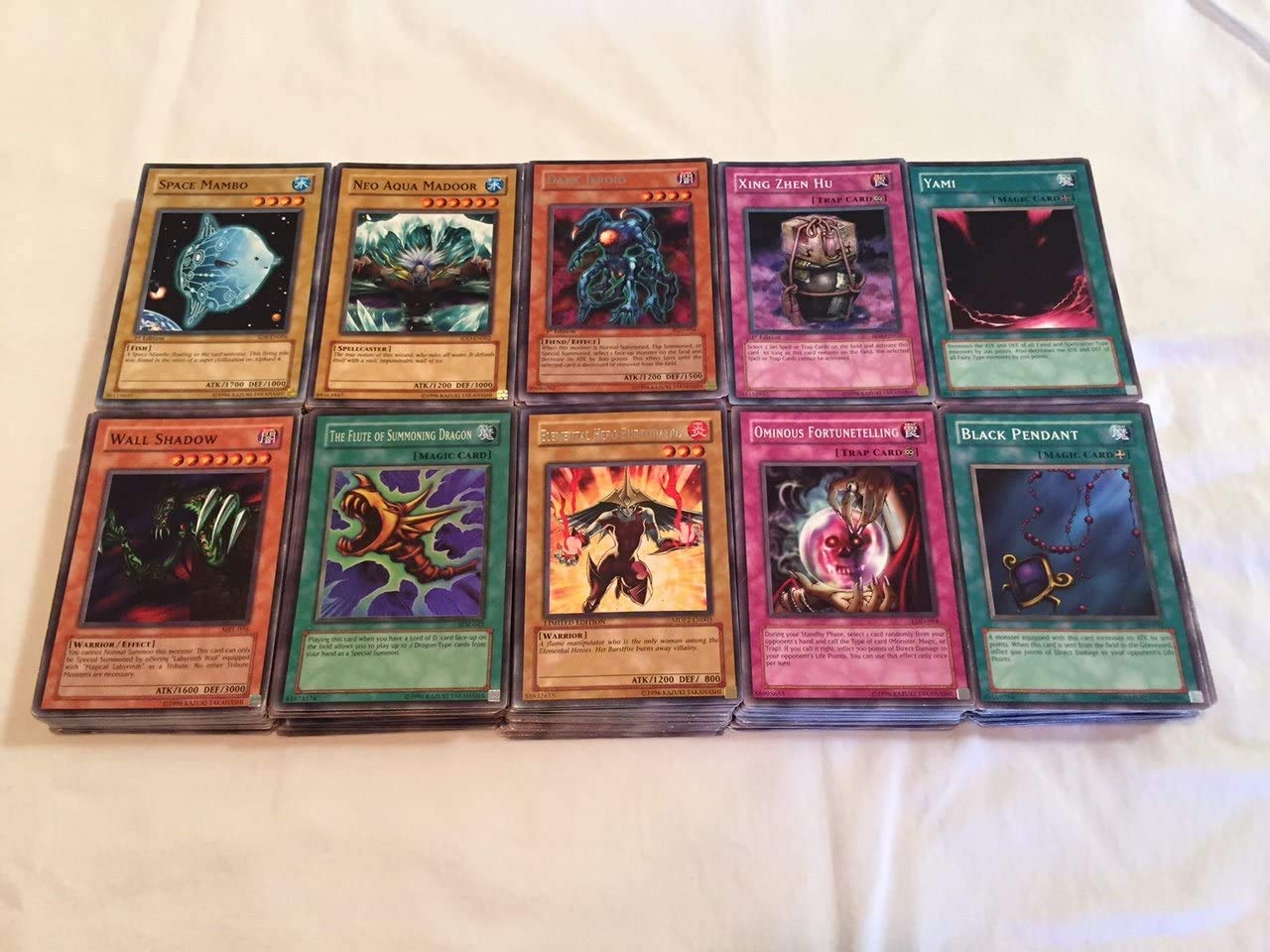 Yu-Gi-Oh! 500 assorted cards in tin packaging for collectors and traders.
