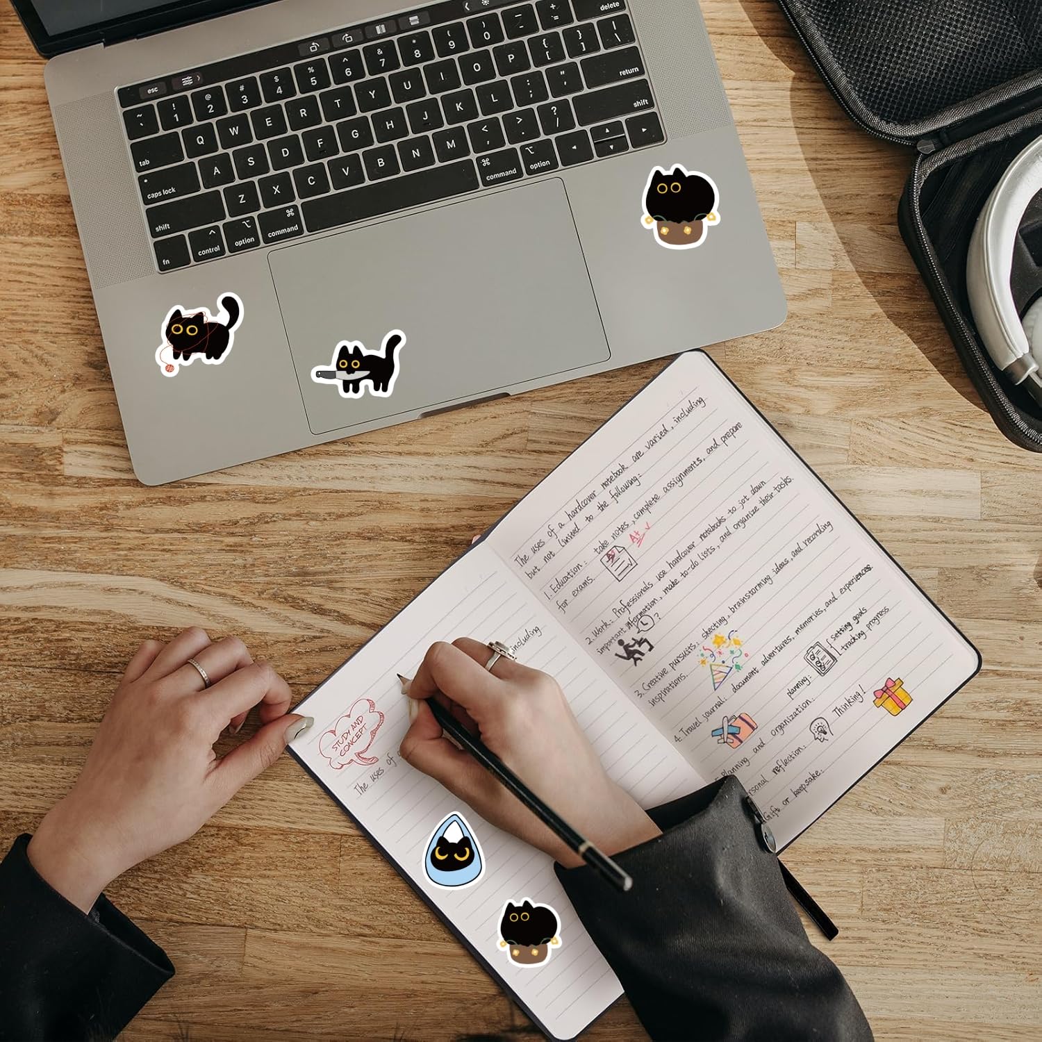 Yuanqichuanglian black cat stickers on a tablet for portable, fun customization