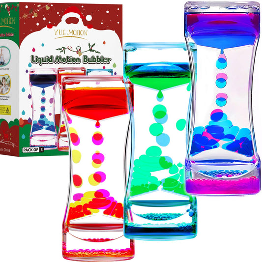 YUE MOTION liquid motion bubbler on a desk promotes calming focus.