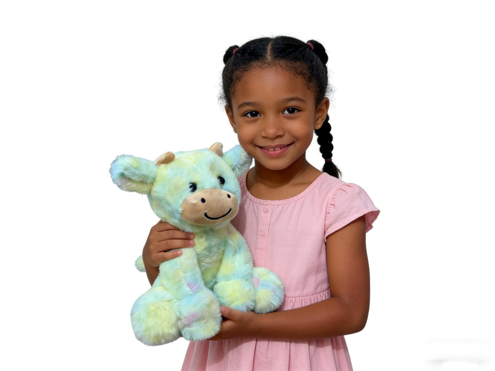 YUKOUQIAN cow stuffed animal as a bedtime companion for children.