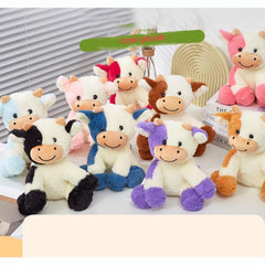 YUKOUQIAN cow plush on a bed, perfect bedtime companion.