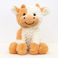 YUKOUQIAN cow plush doll soft fabric close-up, ultra-soft texture ideal for hugs every night.