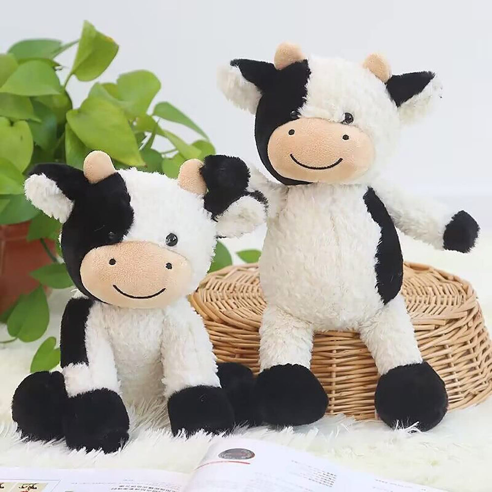 YUKOUQIAN cow plush doll close-up shows fluffy fabric and gentle stitching.