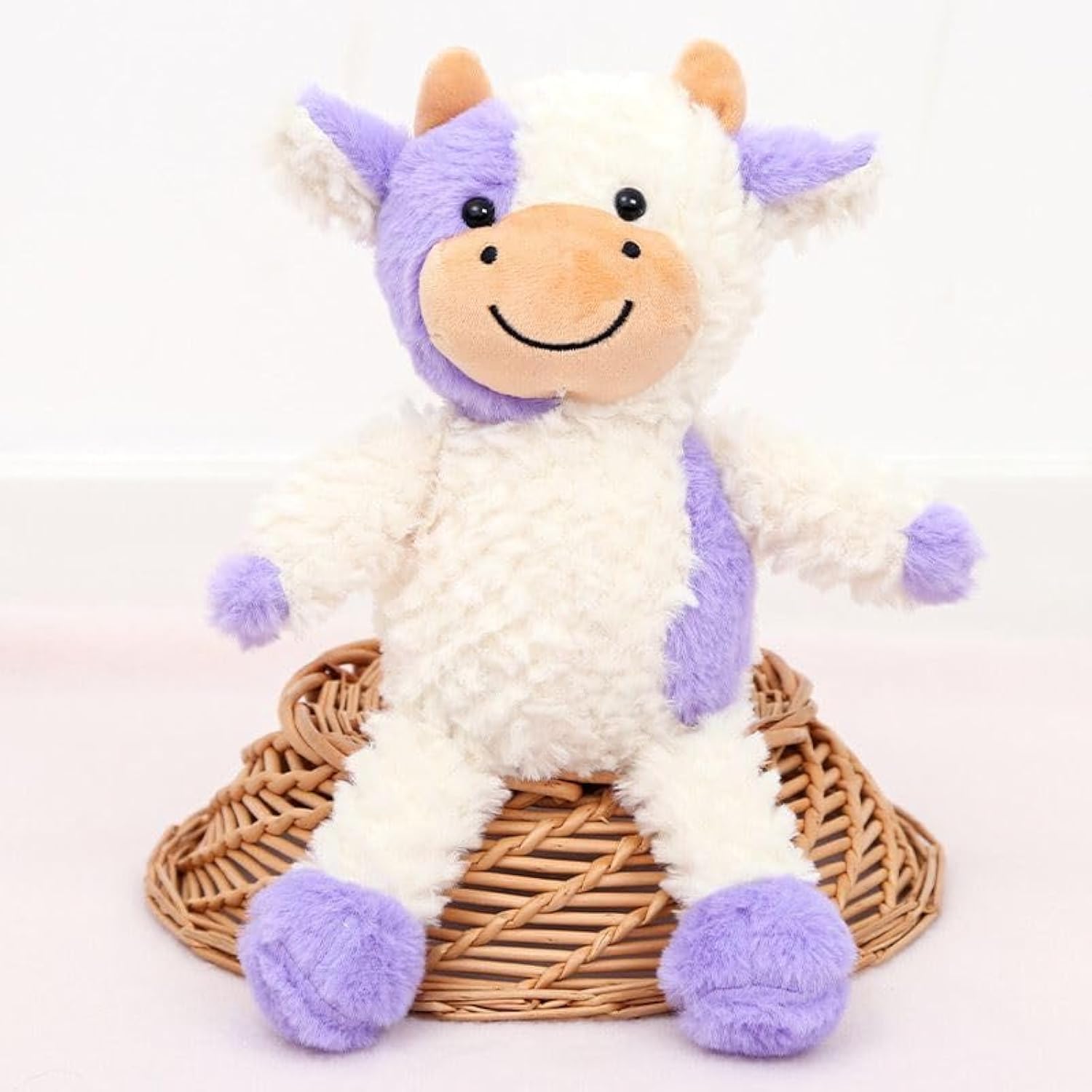 YUKOUQIAN cow plush standing purple demonstrates soft, huggable comfort.