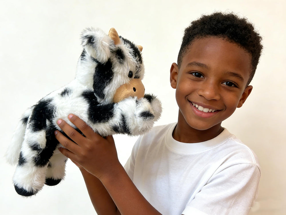 YUKOUQIAN cow plush close-up shows unique patterns and friendly face
