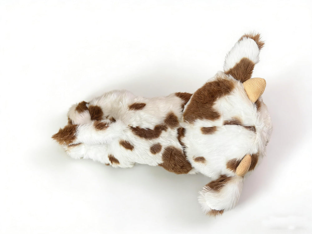 YUKOUQIAN cow plush vacuum-pack-opening demonstrates easy reshaping after unpacking.