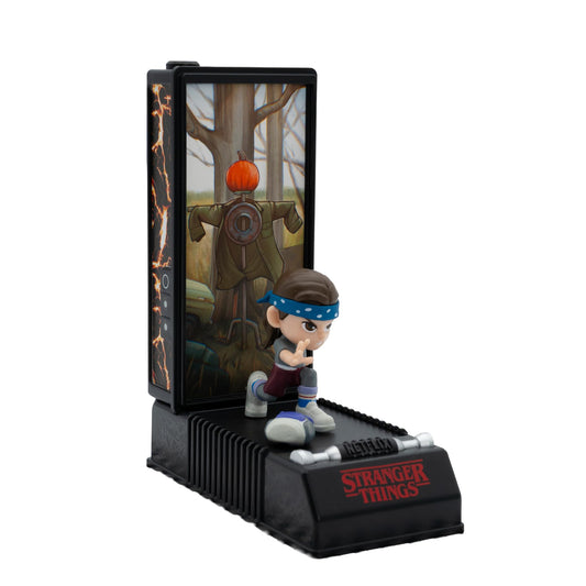 YuMe capsule inner content with mystery figure and clues for discovery