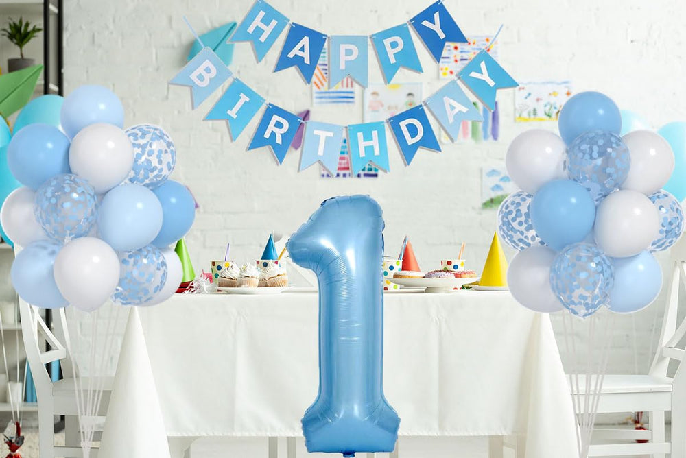 Yumiche first birthday decoration layout showing blue and white theme