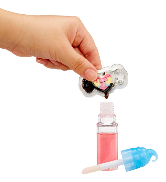 Yummiland lava color drops shown with lip gloss for a lava lamp effect.