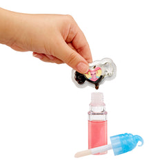Yummiland lava color drops shown with lip gloss for a lava lamp effect.