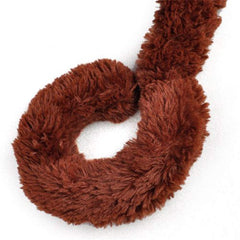 YunNasi large stuffed monkey on bed, cozy decor accent and playful mascot