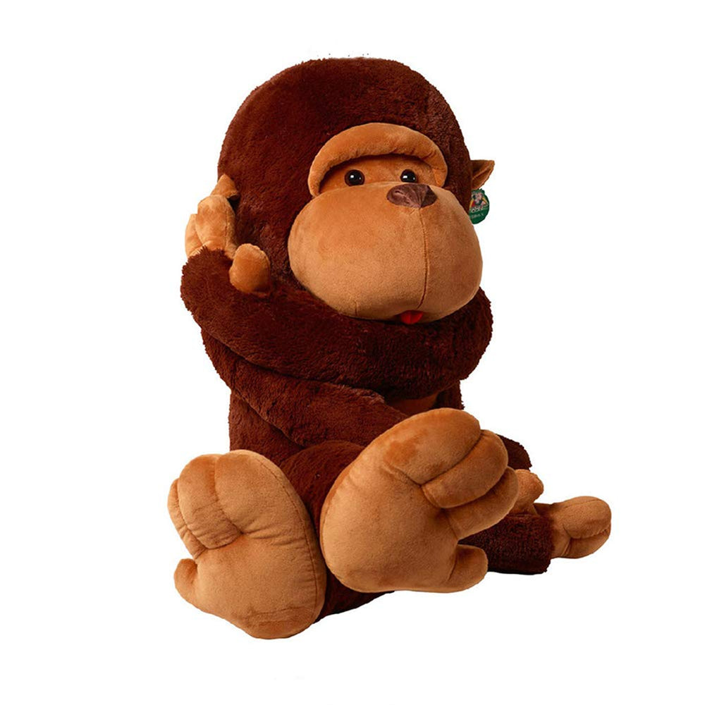 YunNasi large stuffed monkey sitting on sofa, inviting cuddle and storytelling