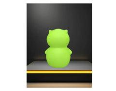 Zacopne Bobs Burgers Kuchi Kopi night glow vinyl figurine used as decor.