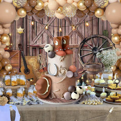 Zafena brown cowboy theme cake display completes rustic dessert setups.