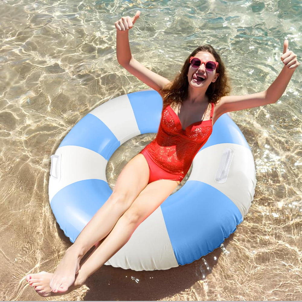 Zaruatu two adults relaxing on striped floats during sunny summer holiday.