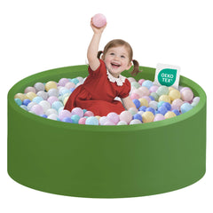 Zedachica ball pit close-up of green foam interior for safe toddler play.