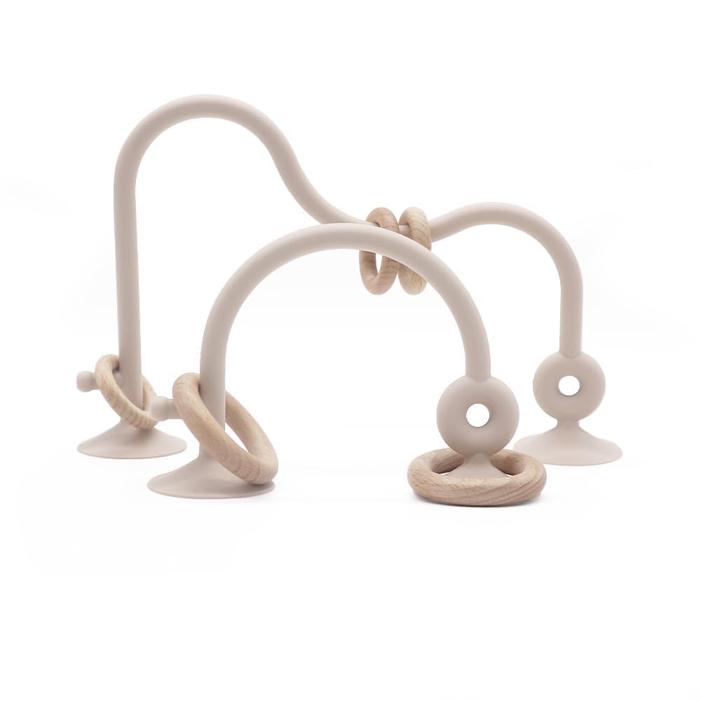 zeeloopbee high chair toy with suction cups secures play on beige surface