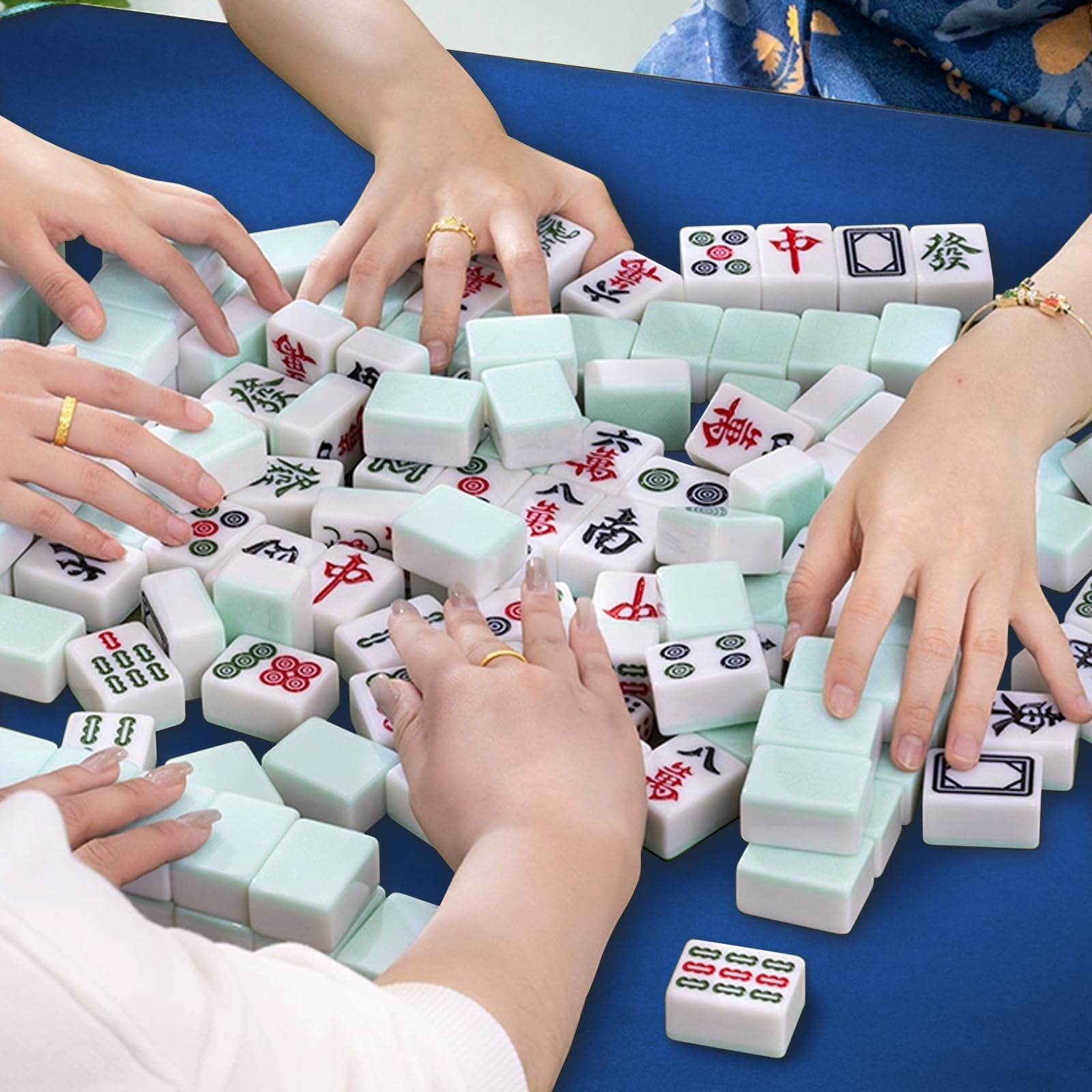 Zeelyer Mahjong Mat blue rolled and stored compactly after use.