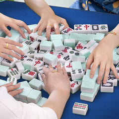 Zeelyer Mahjong Mat blue rolled and stored compactly after use.