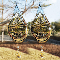 Zeewoo water droplets wind sculpture enhances sunlight reflections outdoors.