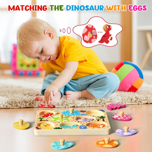 Zeoddler wooden dinosaurs peek from eggs in bright colors.