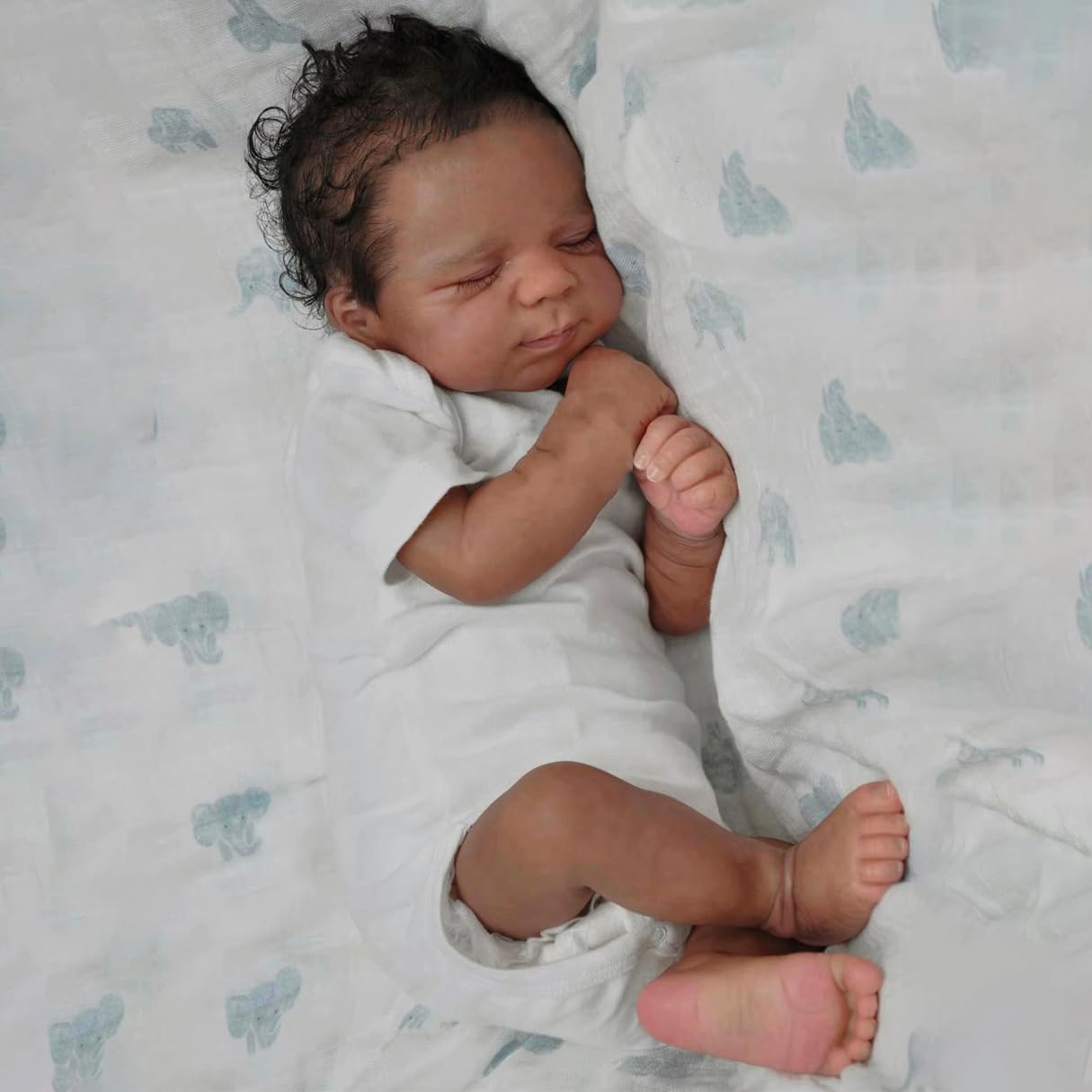 Zero Pam Black Reborn Doll 18in face close-up shows lifelike skin for realistic play.
